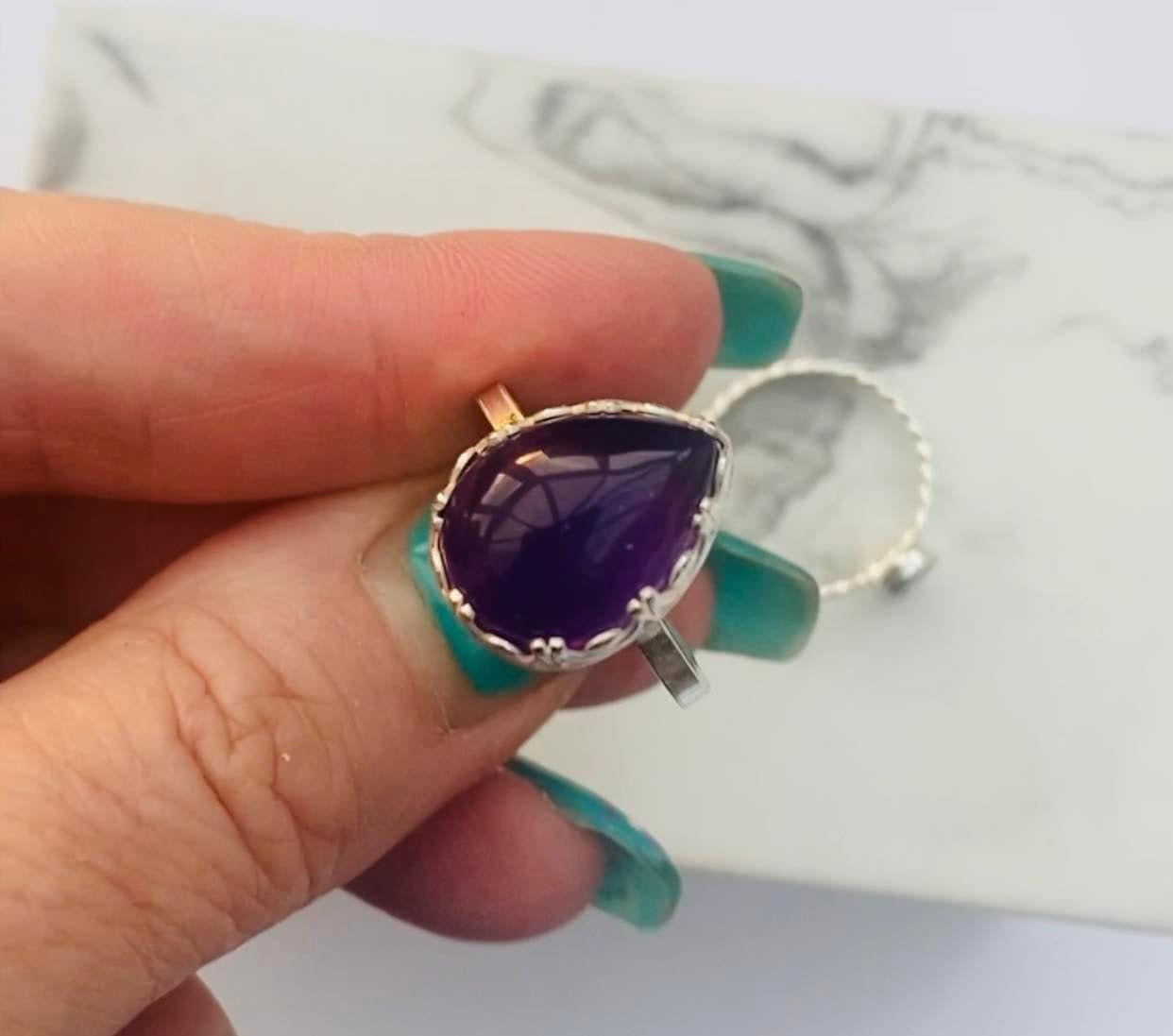 Large amethyst pear silver ring.